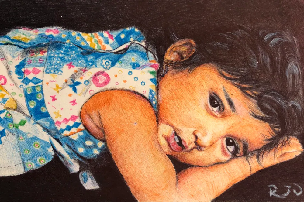 Child lying on their side